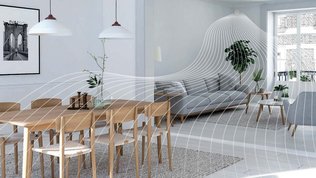 Ein Wohn-Esszimmer mit einer Lüftungsanlage ausgerüstet, die frische Luft in den Raum bringt.